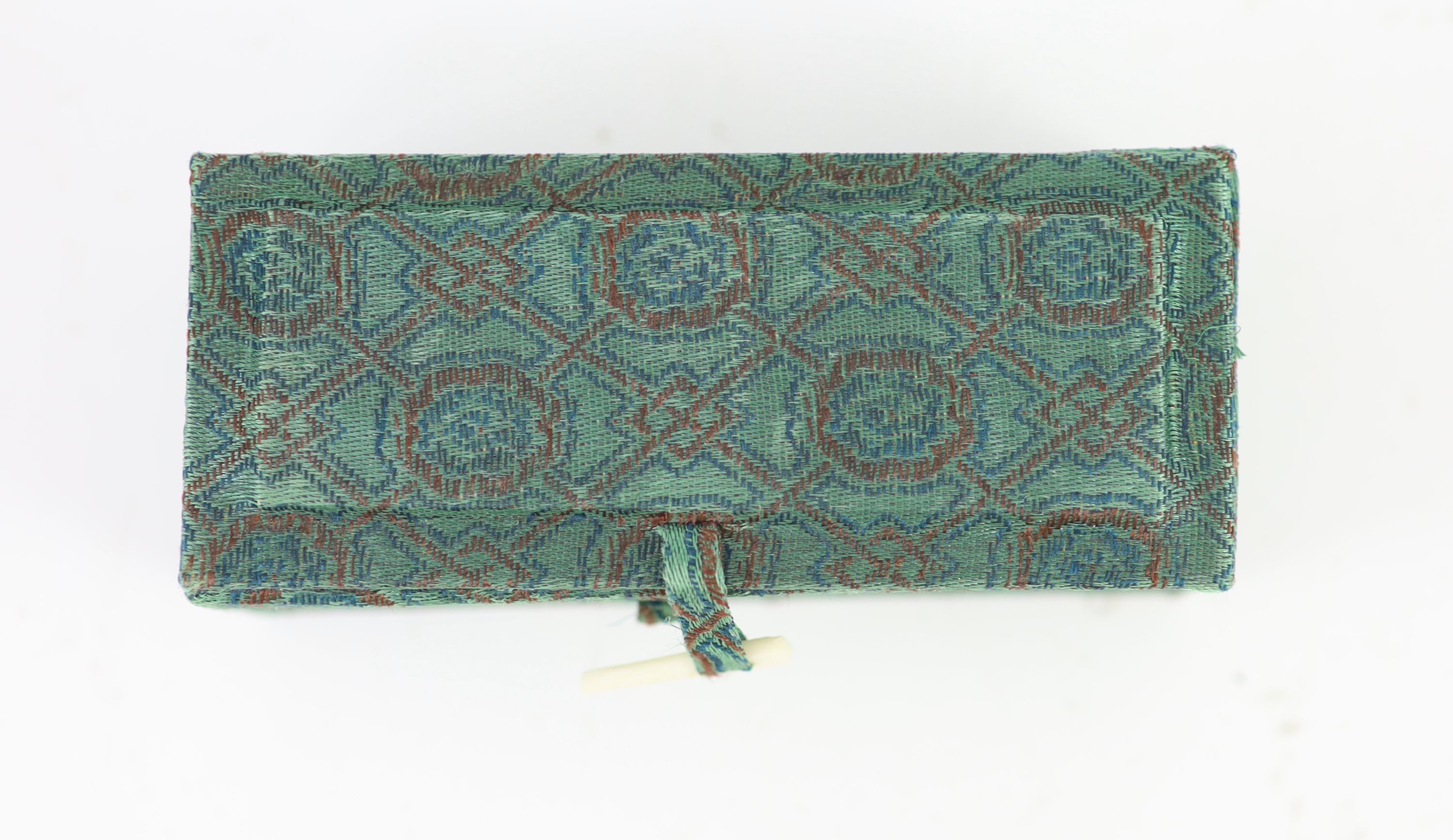 A Chinese ‘chicken bone’ jade carving, 17th/18th century 11 cm long including wood stand